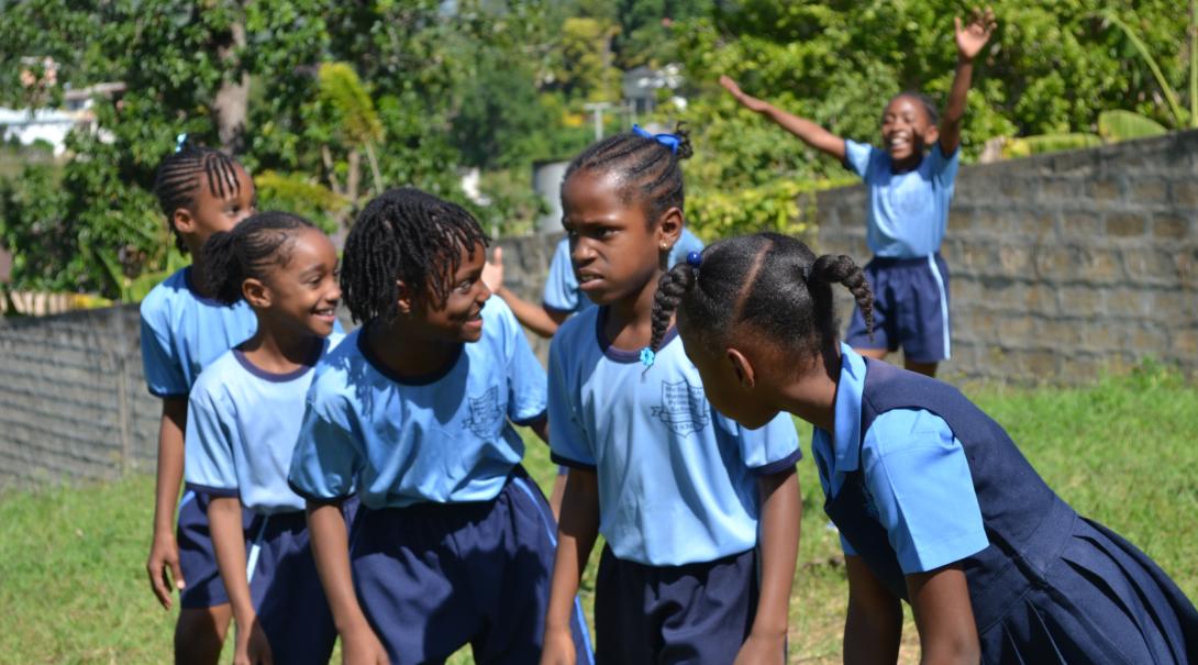 Children at a Projects Abroad physical training session Children gearing up for a run at the opposition as part of their physical training class